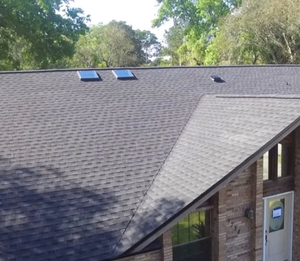 Top and front view of a recently renovated house